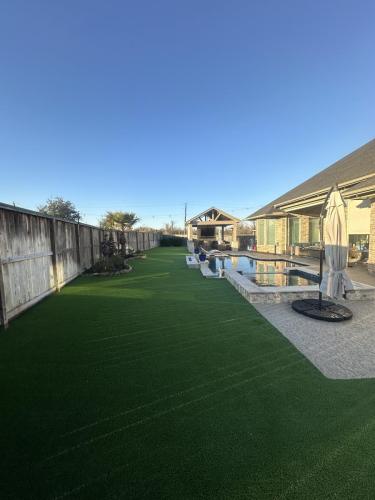 Turf backyard, pool, rymar turf, turf deisgn. Reserve at Clear Lake.