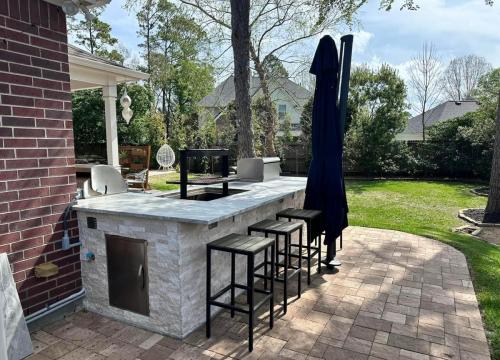 Outdoor kitchen, grilling, backyard kitchen, custom patio. Forest of Friendswood Subdivision, Friendswood. 