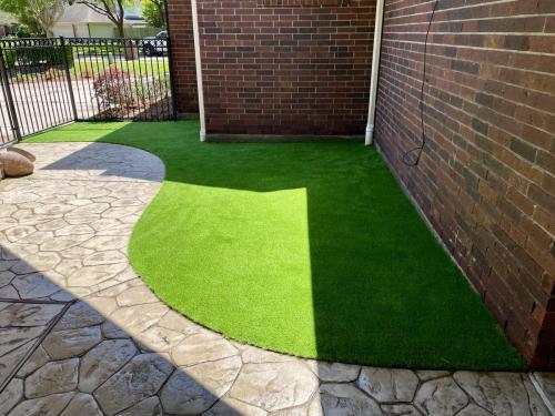 Freeform turf, artificial turf, side yard turf. Eagle Lakes Subdivision, Friendswood. 