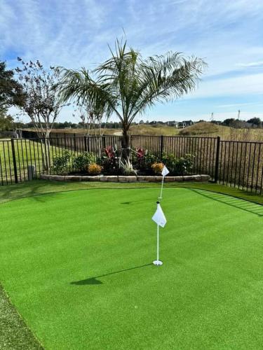 Turf design, putting green, backyard turf, rymar turf. Turf project. Magnolia Creek Subdivision, League City. 