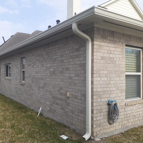recently installed gutters and downspout in Friendswood