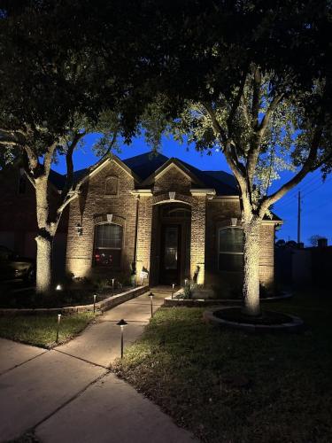 Landscape lighting, pool lighting, tree uplighting, walkway lighting