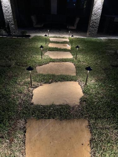 Landscape lighting, pool lighting, tree uplighting, walkway lighting