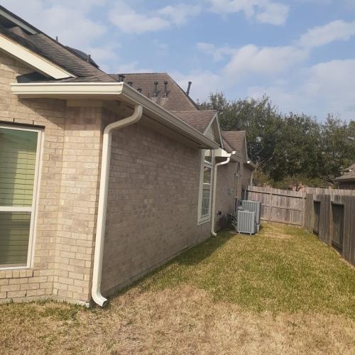new gutters on the side of a house