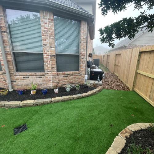 turf backyard and drain for house in Friendswood