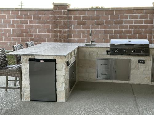 Outdoor kitchen, grilling, backyard kitchen, custom patio. Westwood Subdivision, League City.