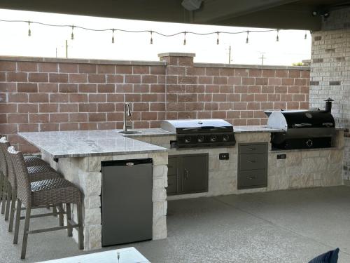 Outdoor kitchen, grilling, backyard kitchen, custom patio. Westwood Subdivision, League City.