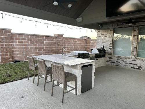 Outdoor kitchen, grilling, backyard kitchen, custom patio. Westwood Subdivision, League City.
