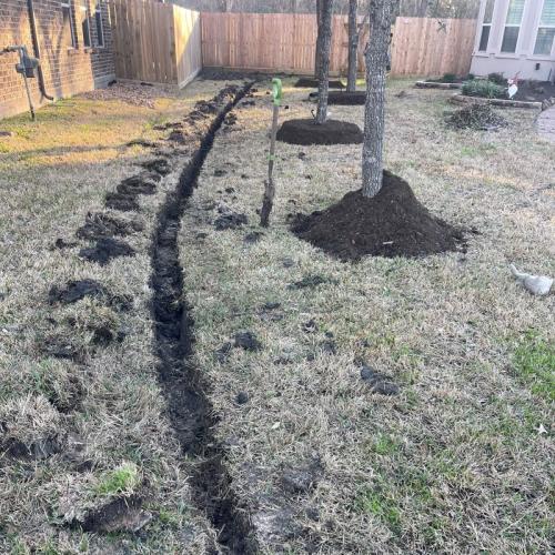 dugout drainage pipe going around trees
